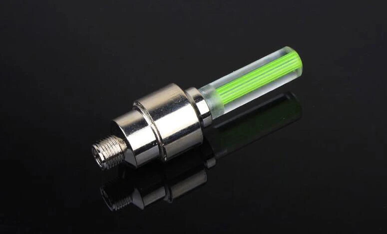ฝาครอบจุ๊บลมยาง LED สำหรับรถจักร – ไฟล้อเรืองแสงเปิดใช้งานด้วยการเคลื่อนไหว มี 4 สี